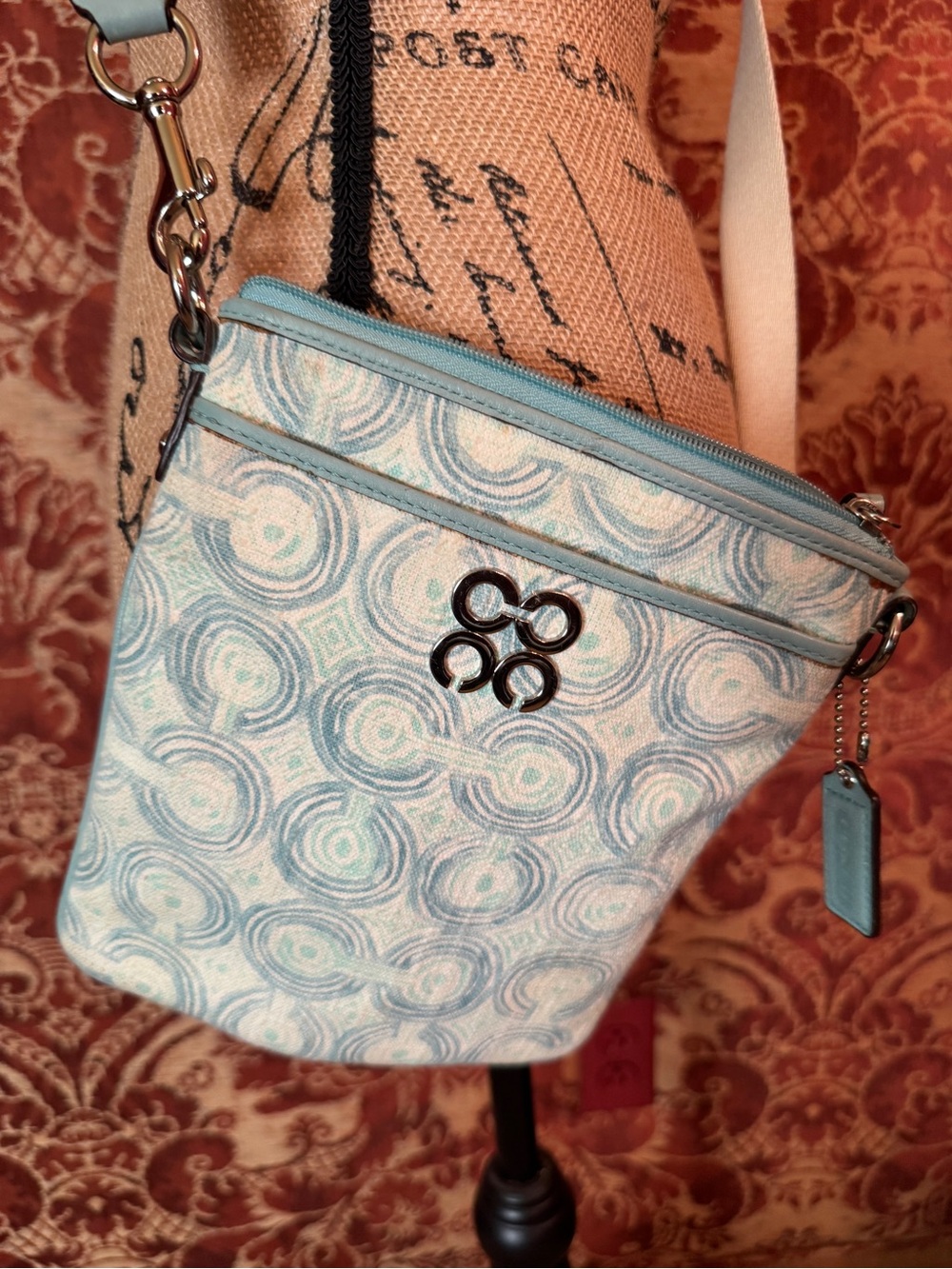 Coach Light Blue Swirl Pattern Crossbody Bag with Silver Logo